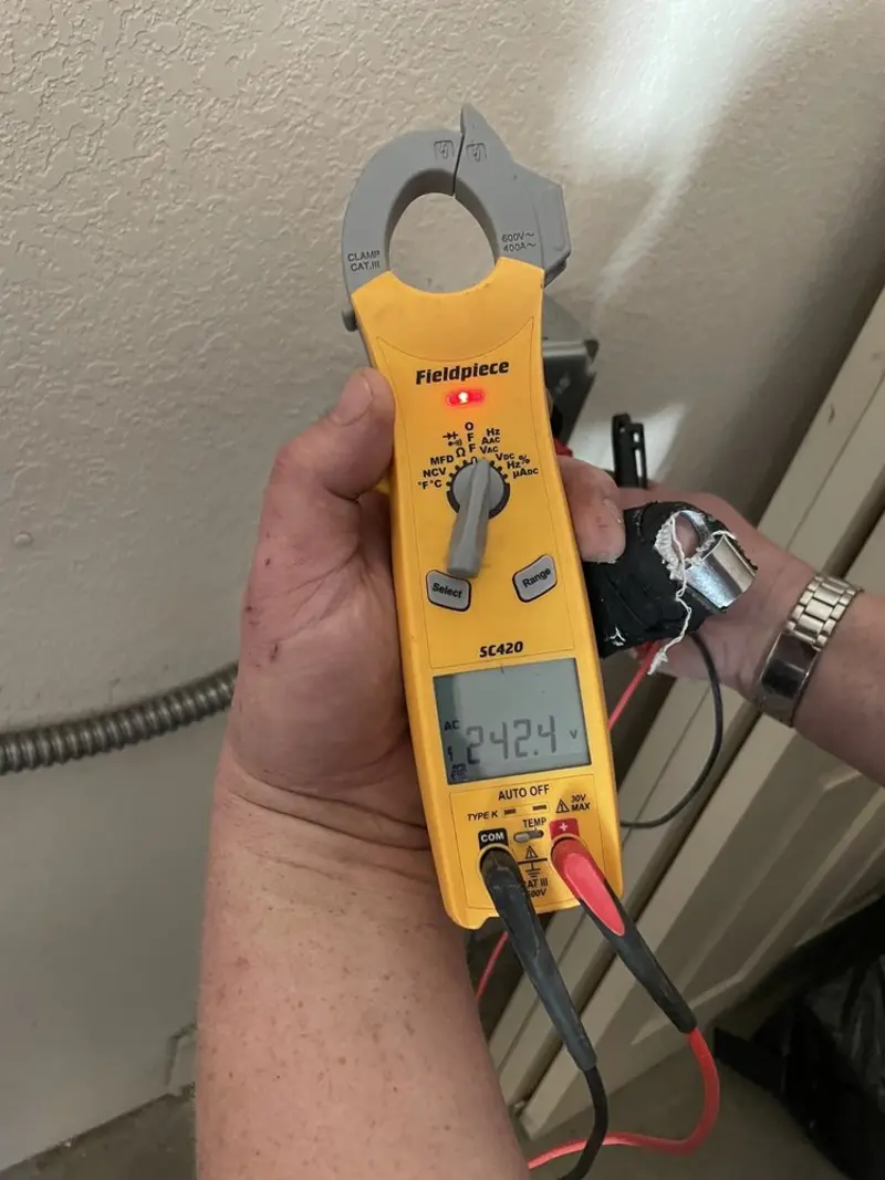 Voltage testing with clamp meter during Outlet Installation in Wadesboro